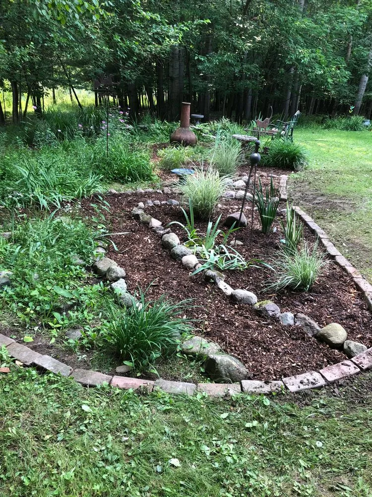 Professional outdoor landscaping with custom design in Barryton, MI by Lynn's Lawncare