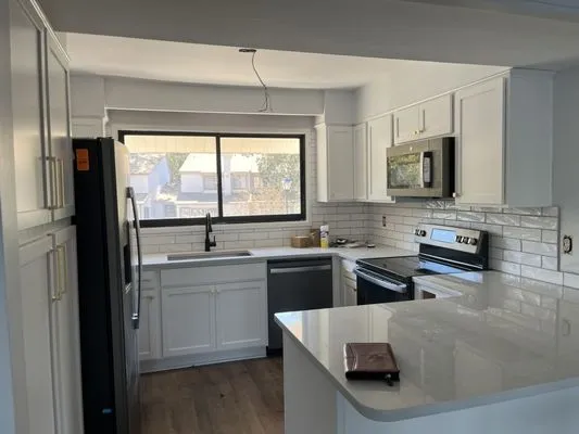 M & C General Construction Logo