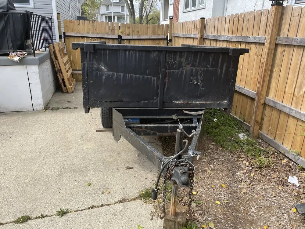 Affordable lawn care service for homes in Baltimore, MD by M & C Thompson Services