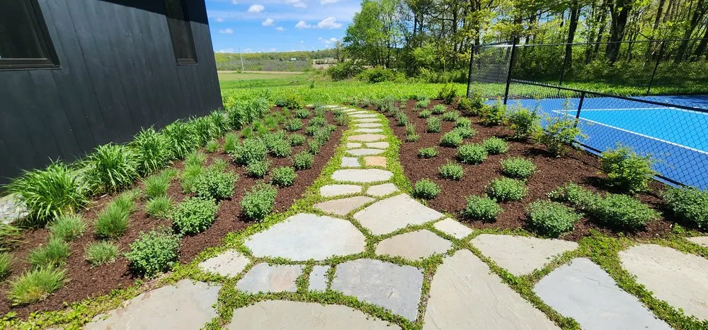 Affordable lawn care service with custom design in Wappingers Falls, NY by M & I Palma Landscaping