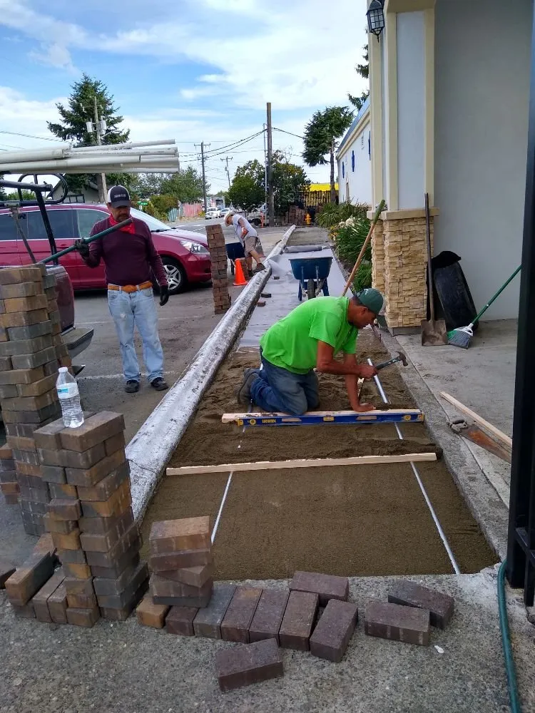 Expert lawn mowing service with custom design in Kent, WA by M & J Landscaping