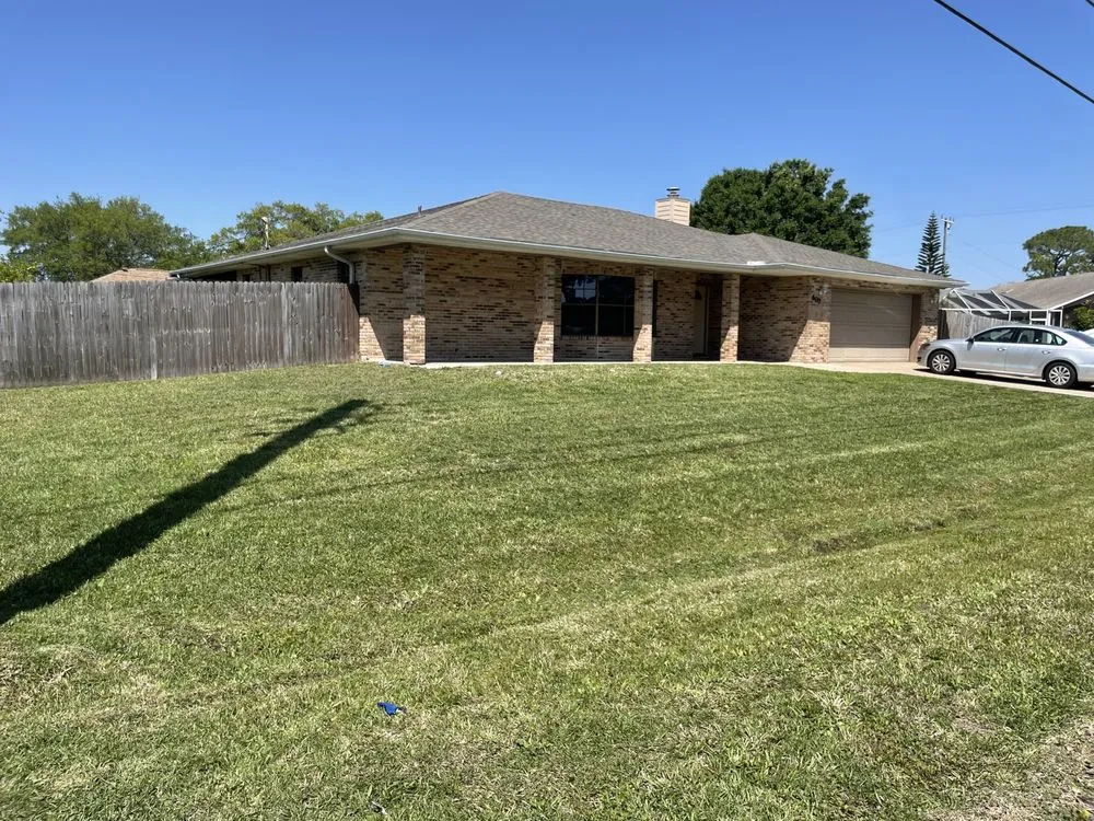 Top-rated outdoor landscaping in Palm Bay, FL by M & J Lawn Care Service