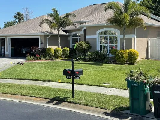 M & J Lawn Care Service Logo