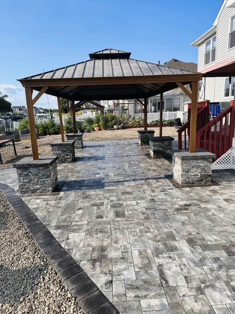 Expert yard cleanup service for homes in North Plainfield, NJ by M & M Construction & Landscaping