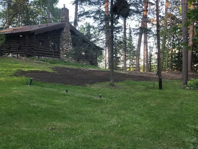 Custom landscape installation for outdoor upgrades in Longville, MN by M & M Landscaping & Excavating