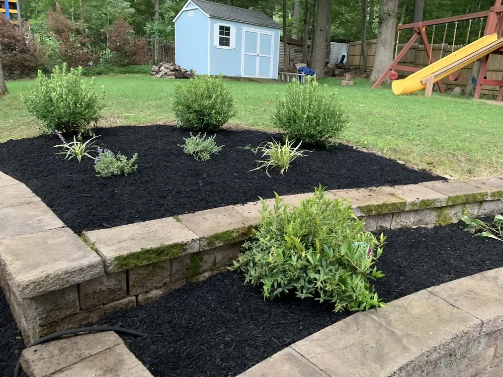 Custom yard maintenance for residential properties in Morristown, NJ by M & M Landscaping