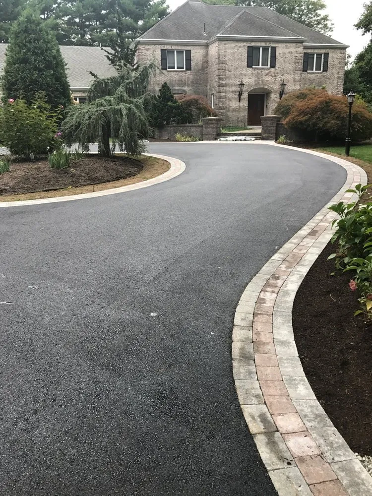 Reliable yard cleanup service in Coventry, RI by M & M Paving and Landscaping