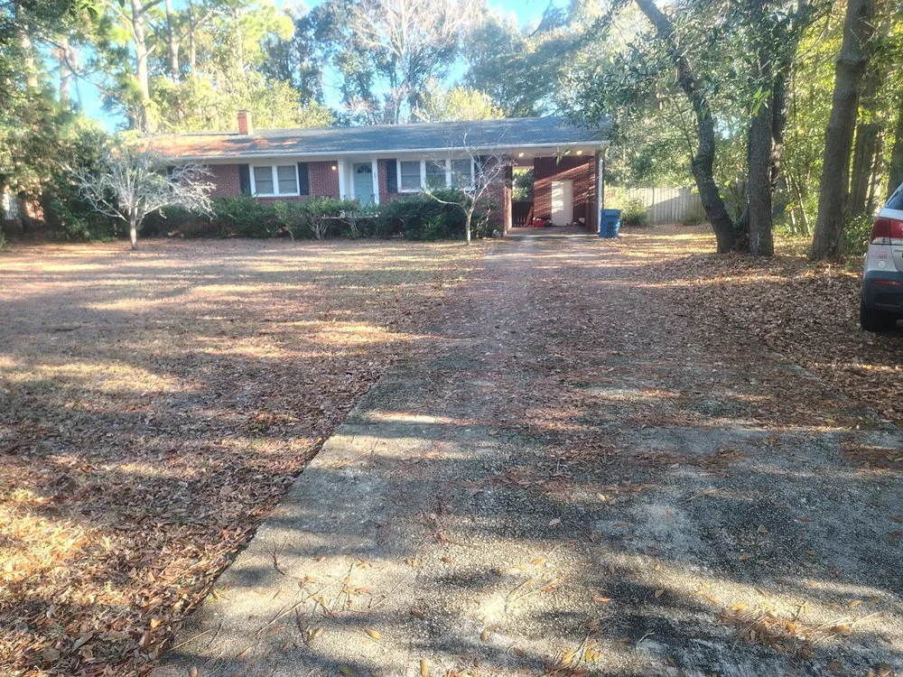 Affordable yard cleanup service for residential properties across Delco, NC - M & T LawnCare & Landscaping