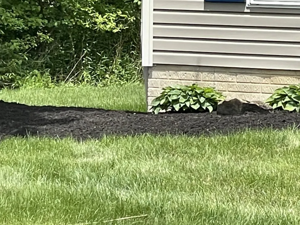 Professional lawn mowing service for residential properties across Cuyahoga Falls, OH - M H Lawn Services