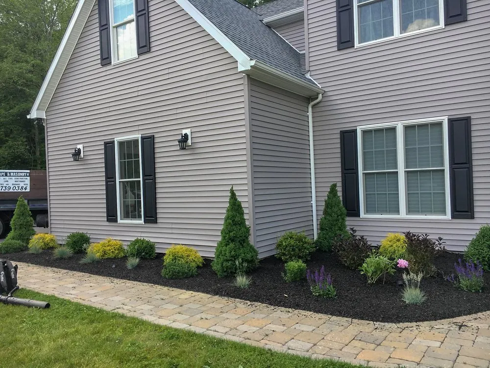 Custom landscape installation in Cortlandt, NY - M LL Trees Service