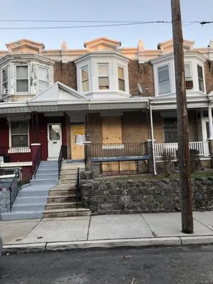 M R Landscape Services Logo