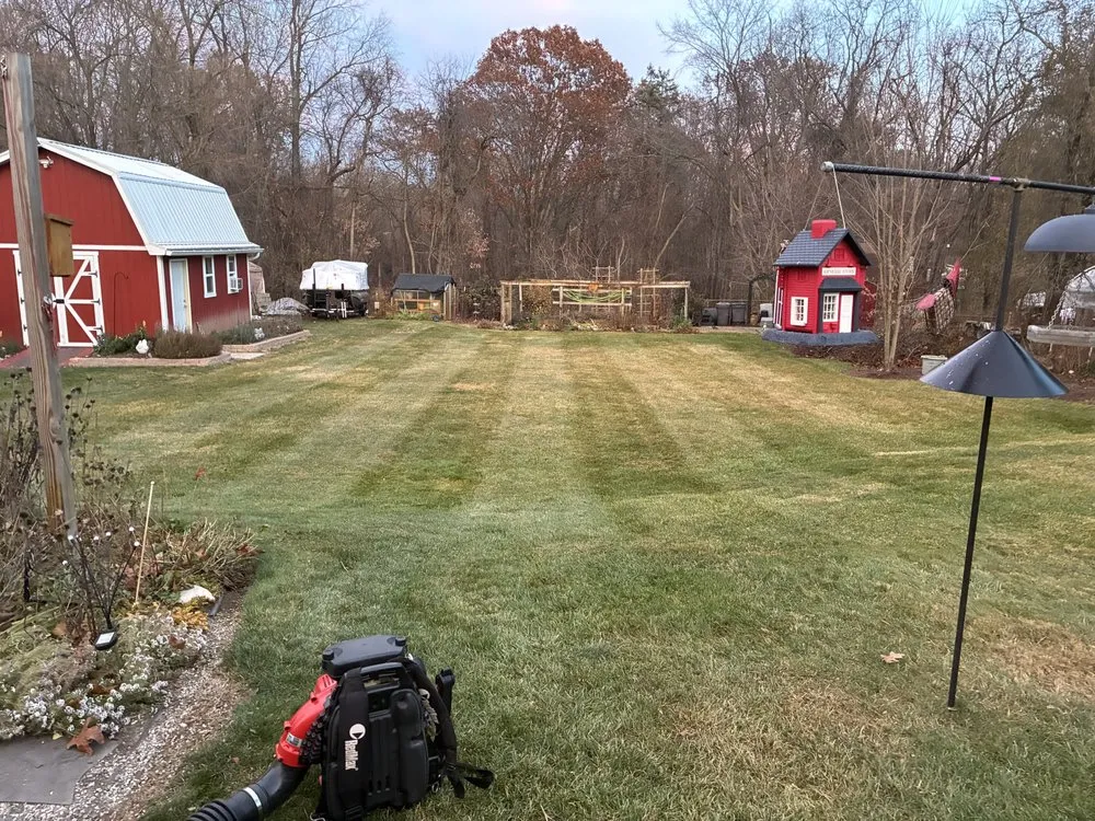 Custom outdoor landscaping with custom design in Highland Township, MI by M R Rounding Lawn & Snow