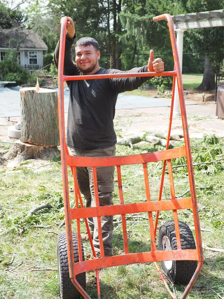 Professional lawn mowing service for residential properties in Garden City South, NY by M. Ramirez Landscaping