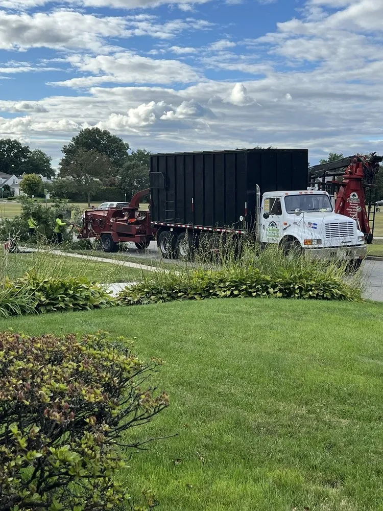 Professional yard cleanup service for outdoor upgrades in Garden City South, NY by M. Ramirez Landscaping