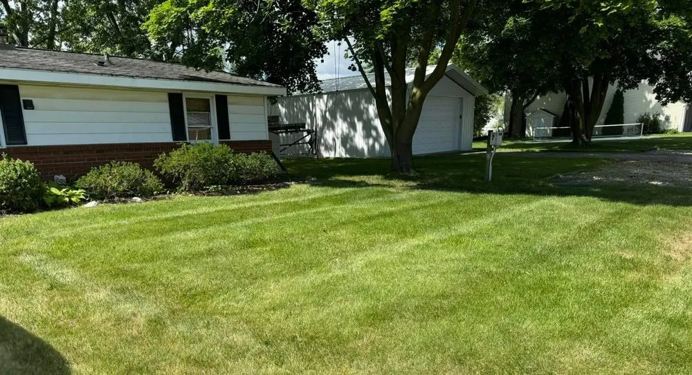 Professional yard maintenance for homes in Fremont, IN by Maagnificent Lawn Care