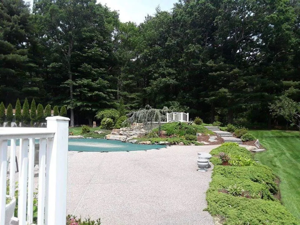 Local lawn mowing service for year-round maintenance in Warwick, RI by Maccarone Family Landscaping