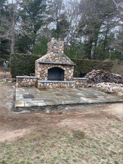 Top-rated landscape design for year-round maintenance in West Yarmouth, MA by Maciel Construction