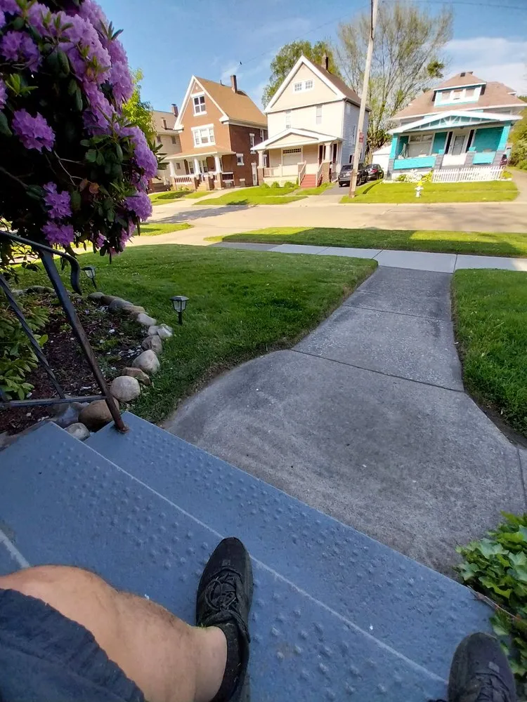 Custom landscape design for year-round maintenance in Newburgh Heights, OH by Mackmo 117 Lawn Care