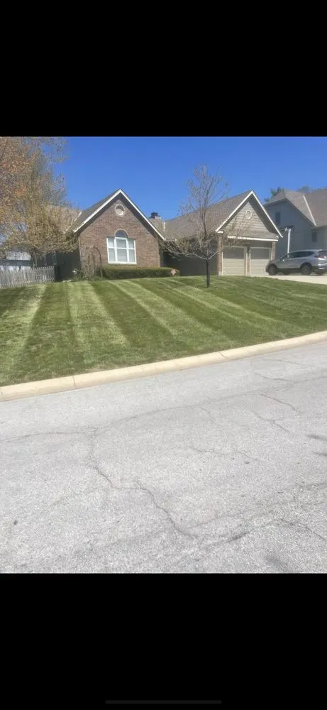 Professional lawn care service for residential properties in Lee's Summit, MO by Macs Lawn Care