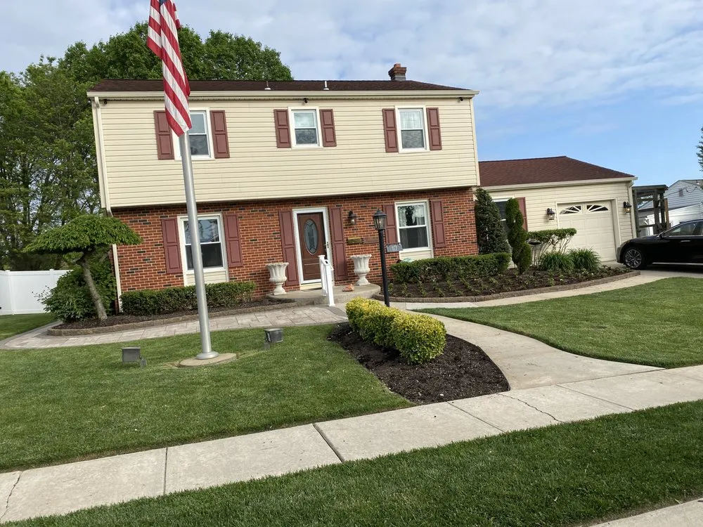 Affordable yard maintenance for residential properties across New Castle, DE - Mad Landscaping & Contracting