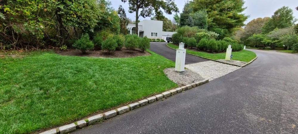 Affordable lawn mowing service in Riverhead, NY by Madrid Landscaping Services