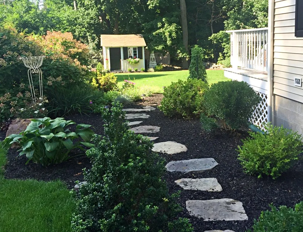 Professional lawn care service for beautiful yards in Andover, MA by Maeve's Garden