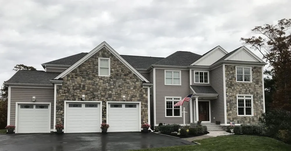 Affordable lawn mowing service for year-round maintenance in Barnstable, MA by Magalhaes Landscape associates