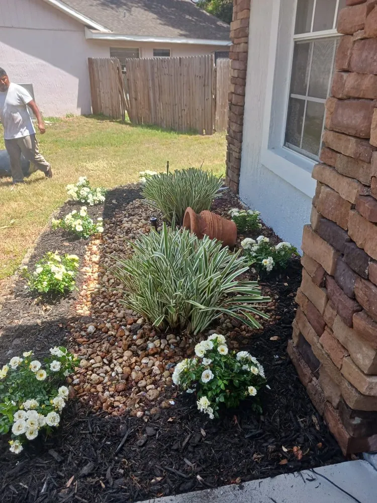 Expert landscaping services for residential properties in Winter Garden, FL by Magalita Lawn Care Inc.