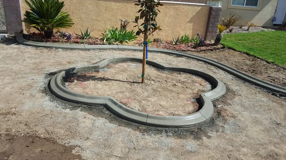Professional yard maintenance with custom design in Fontana, CA by Magic Curbs