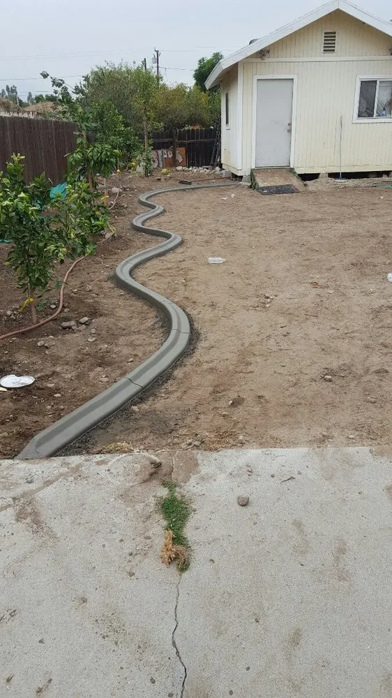 Custom landscape design for residential properties in Fontana, CA by Magic Curbs