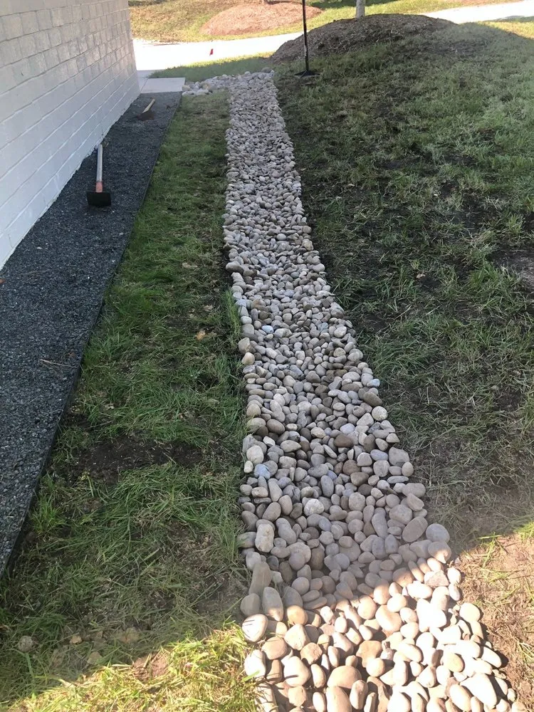 Custom landscape design for year-round maintenance in Chapel Hill, NC by Magic landscaping