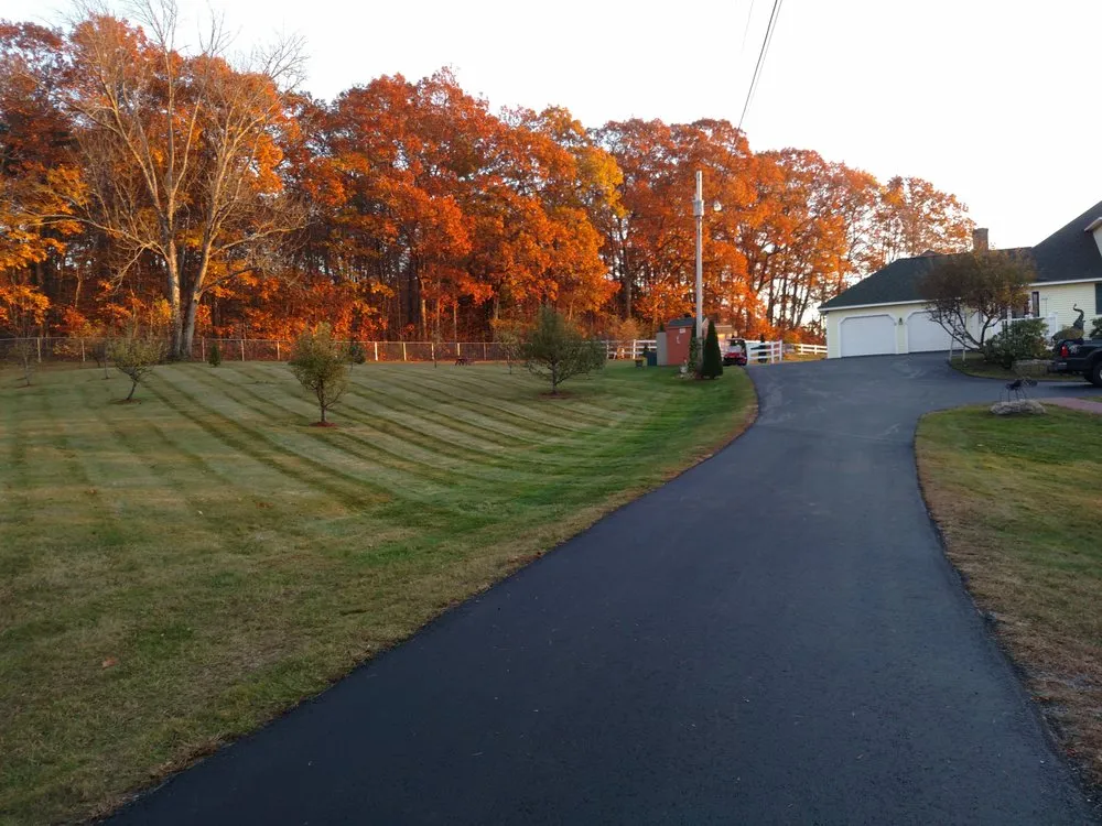 Custom lawn mowing service for beautiful yards in Belmont, NH by Magic Overnight Landscaping