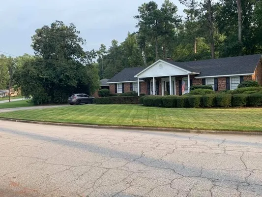 Magnolia Creek Landscape Logo