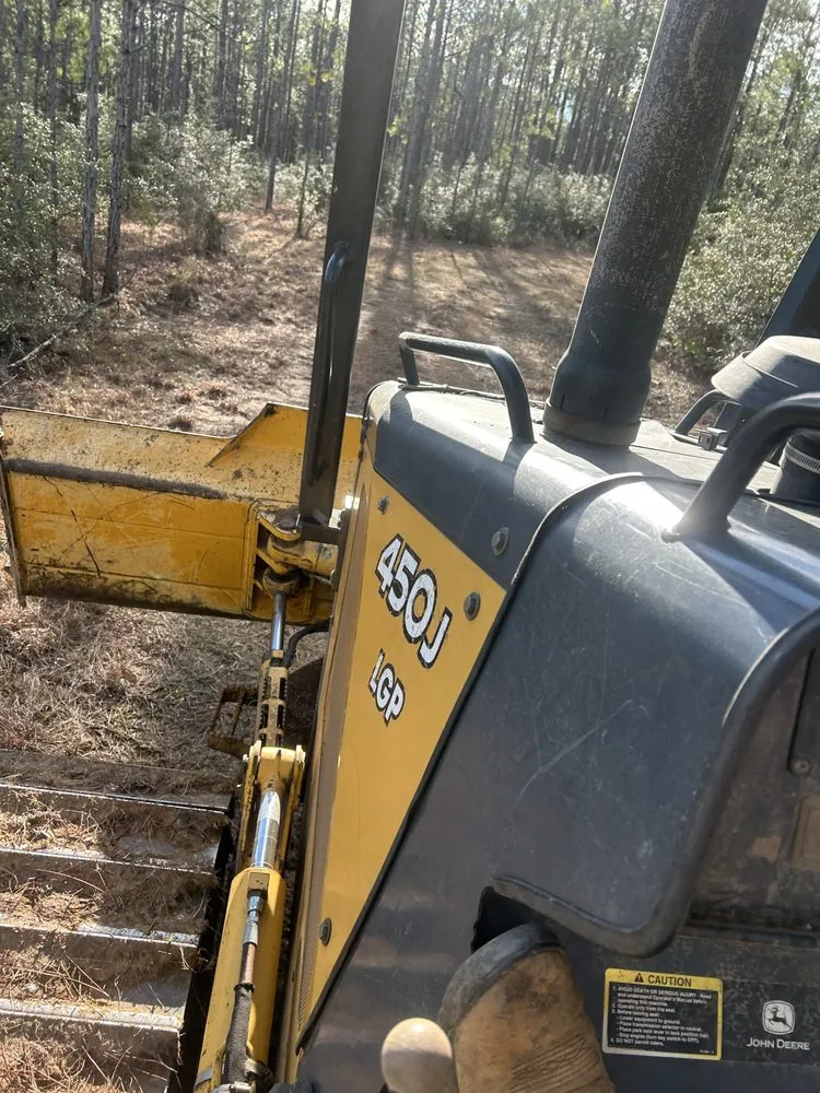 Affordable yard cleanup service for homes in Wiggins, MS by Magnolia Land And Lawn