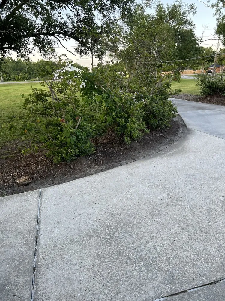 Custom landscape installation in Houma, LA by Mahan's Lawn Care