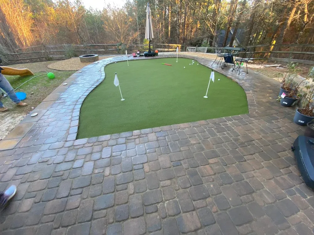 Affordable lawn mowing service for homes in Cumming, GA by Maia Construction