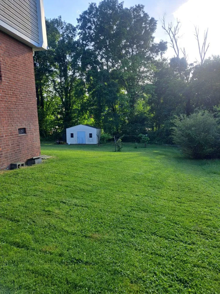 Affordable lawn mowing service for homes in Durham, NC by Mainland residential lawn service