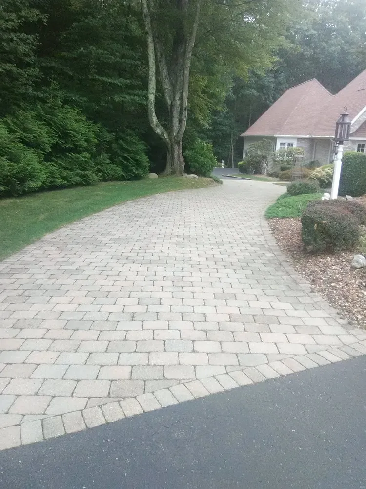 Professional lawn care service for homes in Newtown, CT by Majestic Landscapes