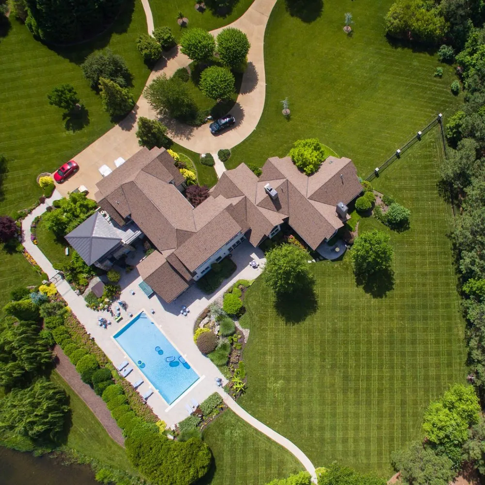 Custom landscape design for beautiful yards across Coram, NY - Making Solid Ground Lawn Care