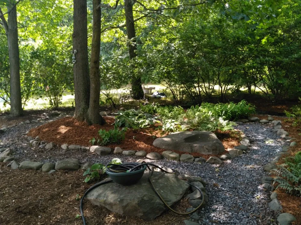 Professional landscape installation with custom design in Dickson City, PA by Maldonado Lawns