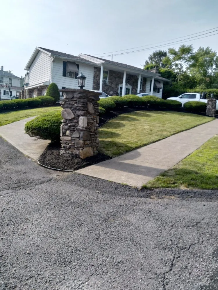 Custom yard maintenance for homes in Dickson City, PA by Maldonado Lawns