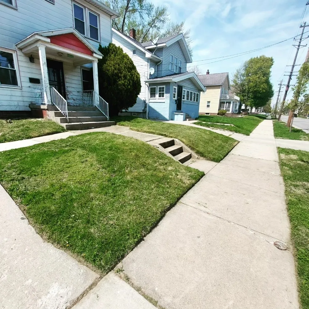 Affordable lawn mowing service for outdoor upgrades in Toledo, OH by Maliks Moving & Cleanup Services