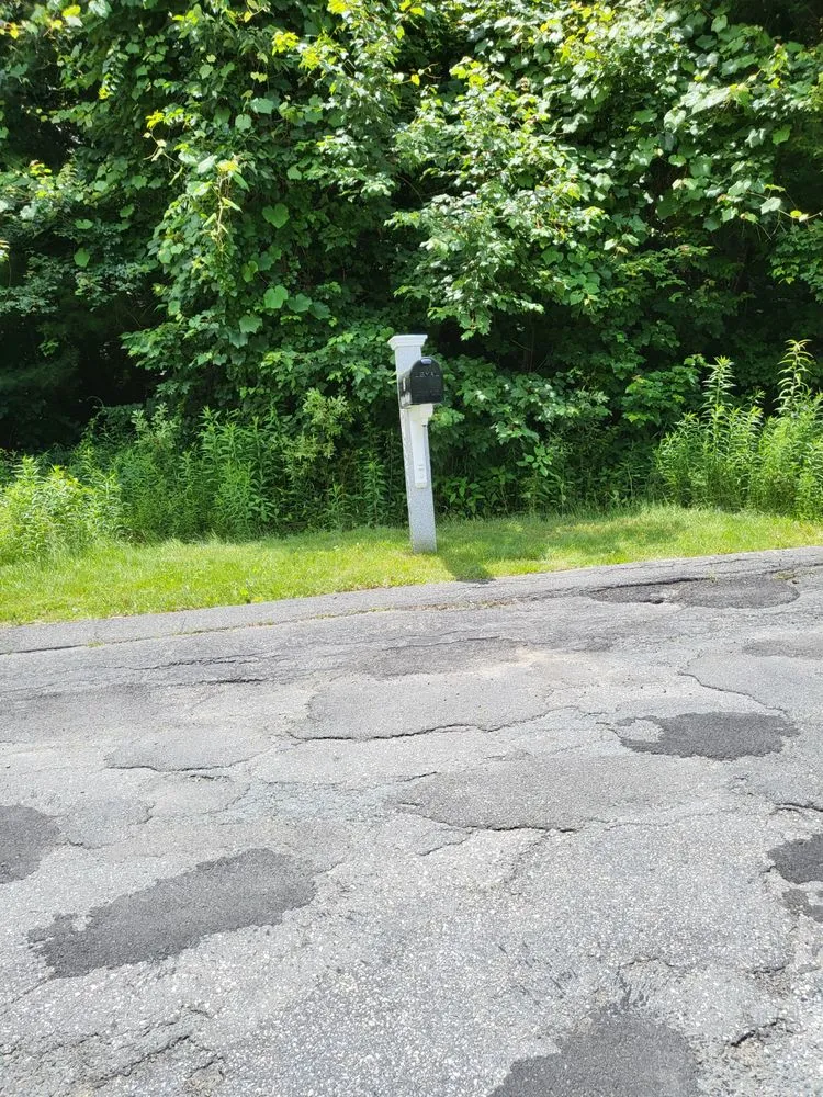 Custom garden landscaping for residential properties across Millville, MA - Maloney Lawn Care