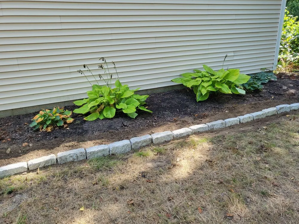 Top-rated outdoor landscaping for beautiful yards in Millville, MA by Maloney Lawn Care