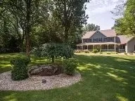 Local yard cleanup service for year-round maintenance across Seekonk, MA - Man Mowing