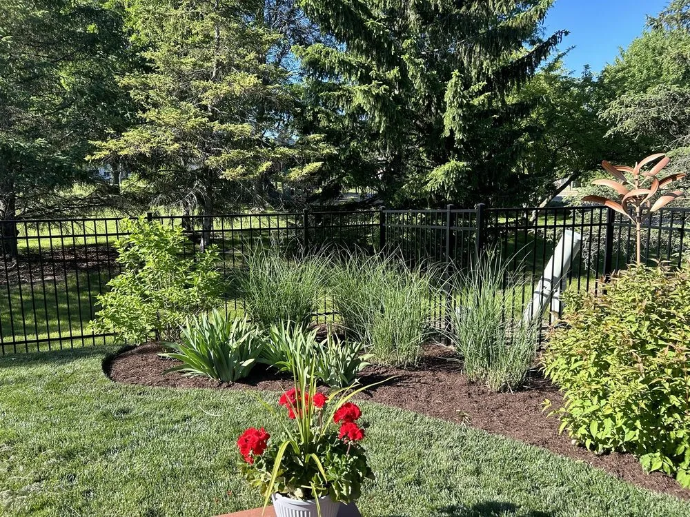 Professional garden landscaping for residential properties in West Chicago, IL by Man Of All Work Landscaping & Tree Specialist