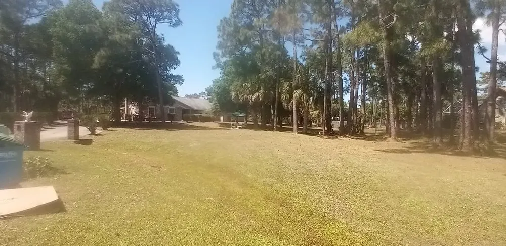 Professional lawn mowing service for homes across Palm Bay, FL - Man Truck Lawn Care