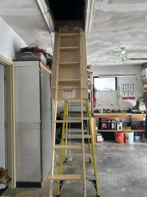 Mann's Construction Logo