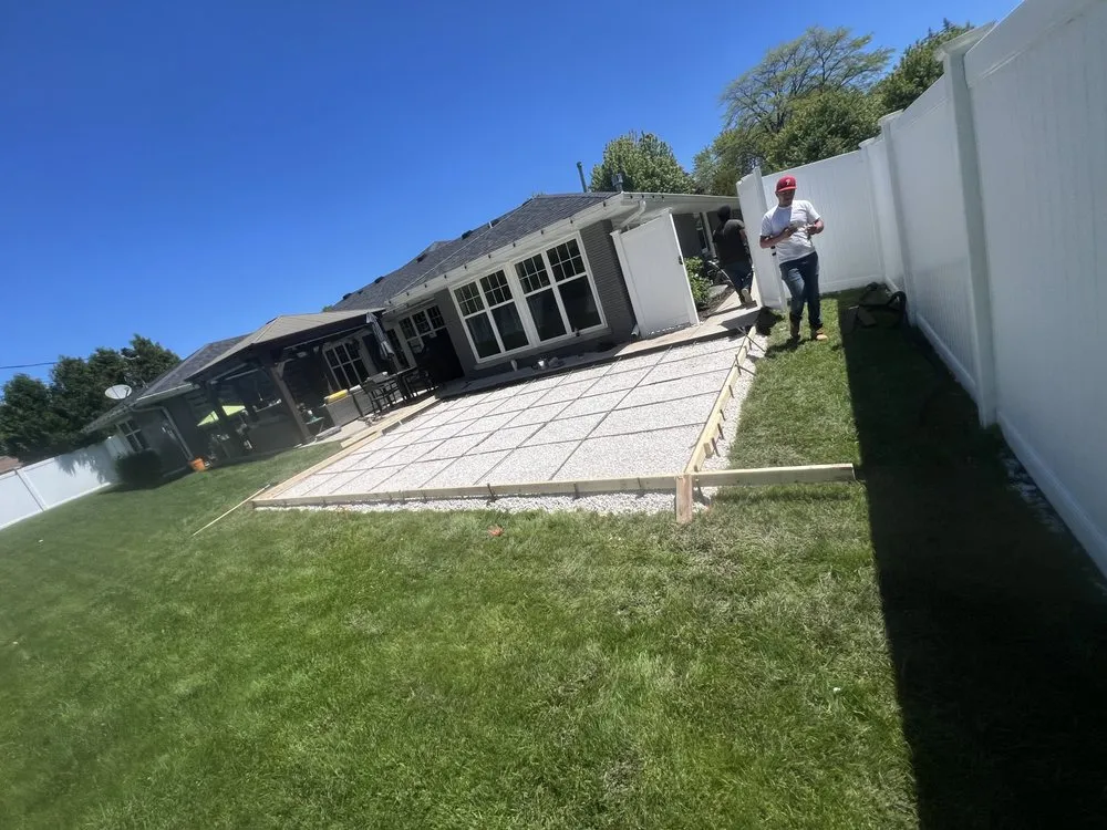 Custom yard cleanup service with custom design in Sheboygan, WI by Manny Concrete And Landscaping