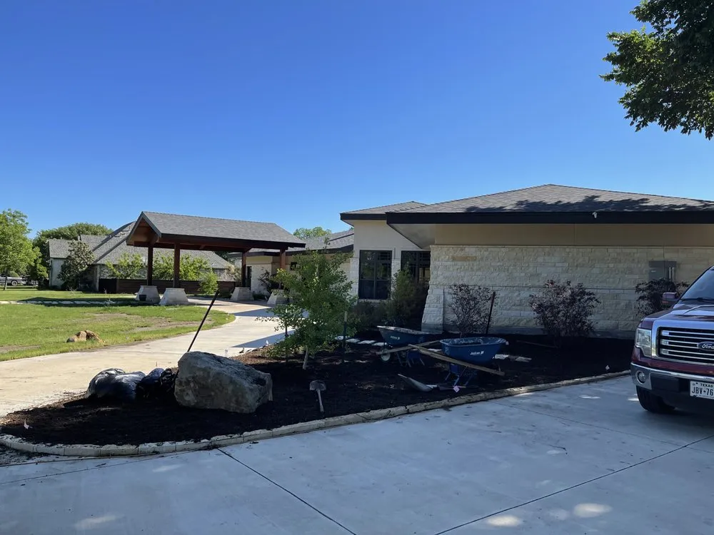 Custom landscape installation in Rockwall, TX by Manny's Landscaping & Lawn Maintenance